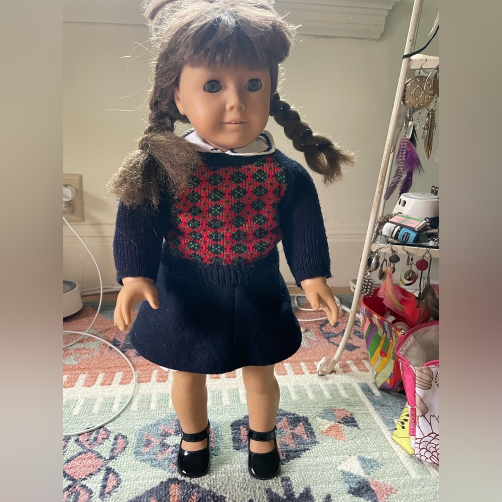 American girl 
Pleasant company Classic Doll with Navy and Red Outfit